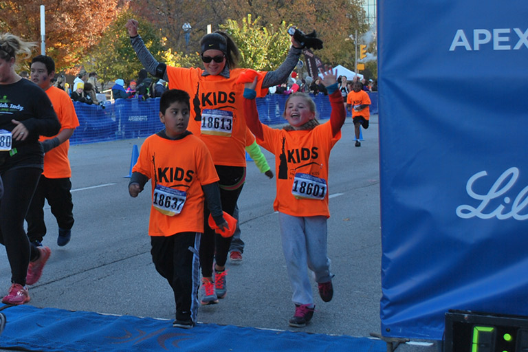 Youth crossing the finish in a race.jpg